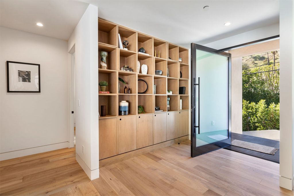 The Beverly Hills Home is a magnificent newly completed architectural residence with great volume and scale now available for sale. This home located at 2220 Coldwater Canyon Dr, Beverly Hills, California; offering 4 bedrooms and 5 bathrooms with over 4,200 square feet of living spaces.