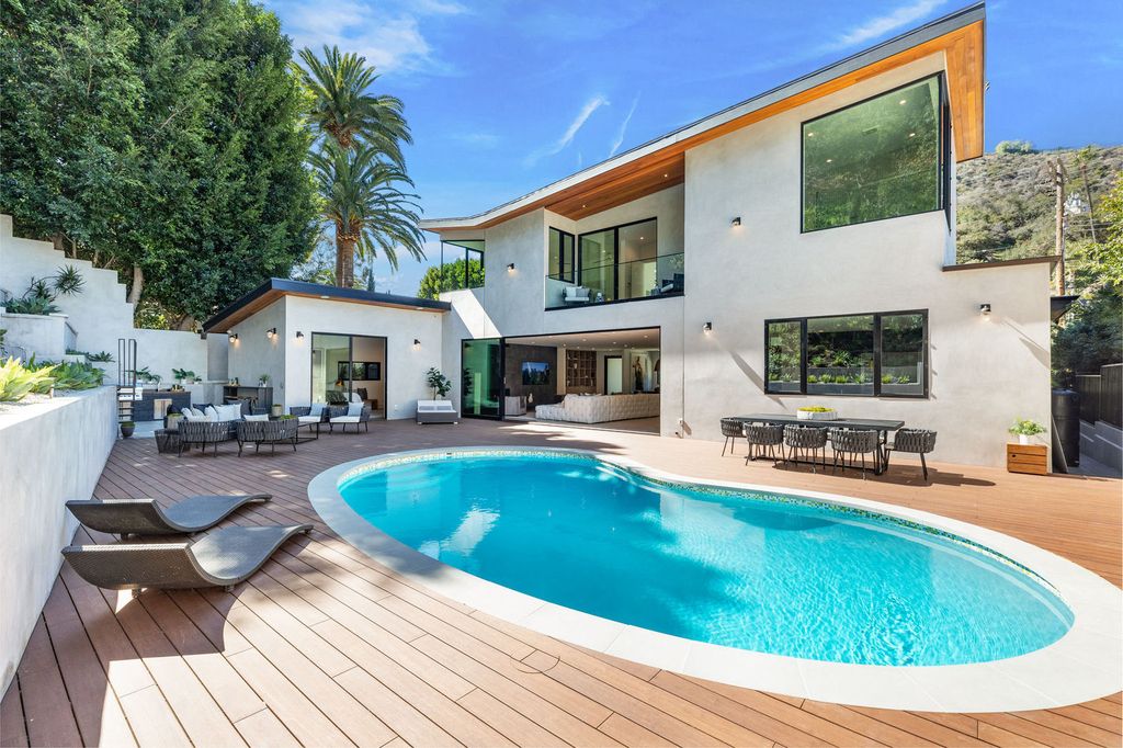 The Beverly Hills Home is a magnificent newly completed architectural residence with great volume and scale now available for sale. This home located at 2220 Coldwater Canyon Dr, Beverly Hills, California; offering 4 bedrooms and 5 bathrooms with over 4,200 square feet of living spaces.
