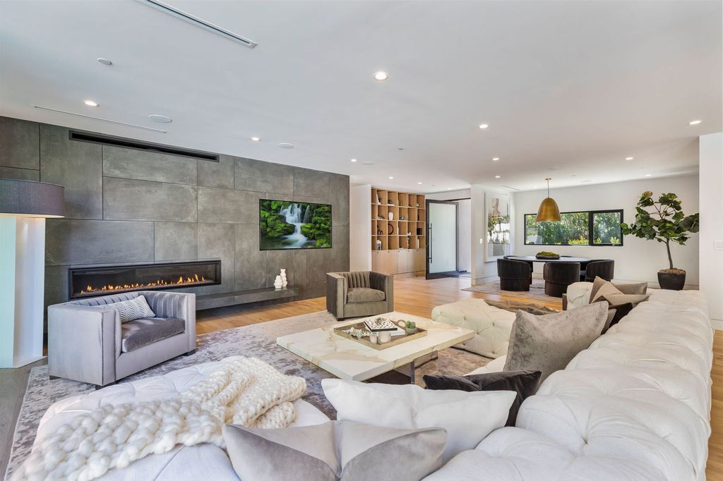 The Beverly Hills Home is a magnificent newly completed architectural residence with great volume and scale now available for sale. This home located at 2220 Coldwater Canyon Dr, Beverly Hills, California; offering 4 bedrooms and 5 bathrooms with over 4,200 square feet of living spaces.