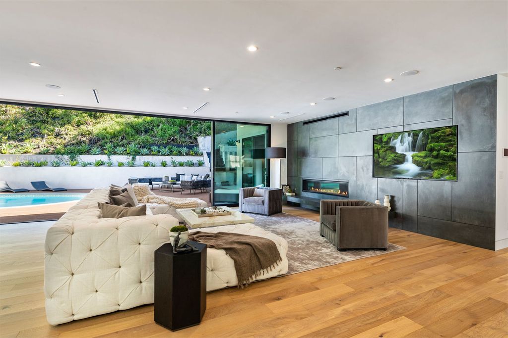 The Beverly Hills Home is a magnificent newly completed architectural residence with great volume and scale now available for sale. This home located at 2220 Coldwater Canyon Dr, Beverly Hills, California; offering 4 bedrooms and 5 bathrooms with over 4,200 square feet of living spaces.