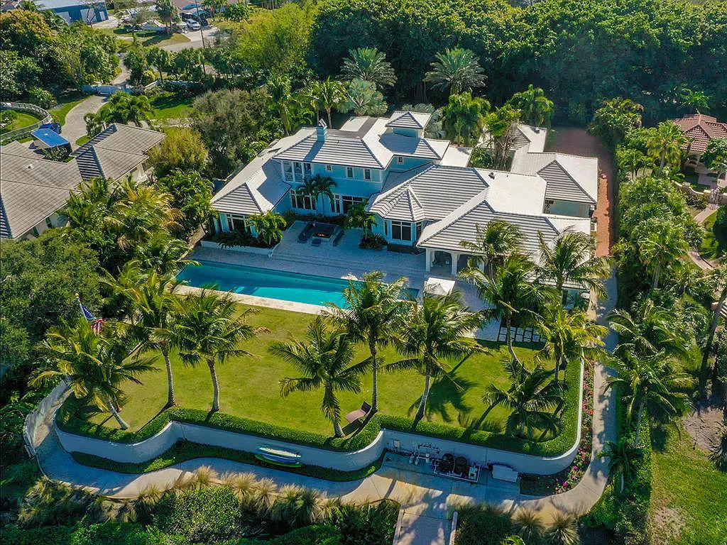 The Waterfront Estate is a Bermuda-Colonial style home has endless wide-water views of the St. Lucie River and Inlet now available for sale. This home located at 3015 SE Saint Lucie Blvd, Stuart, Florida; offering 4 bedrooms and 7 bathrooms with over 7,700 square feet of living spaces.