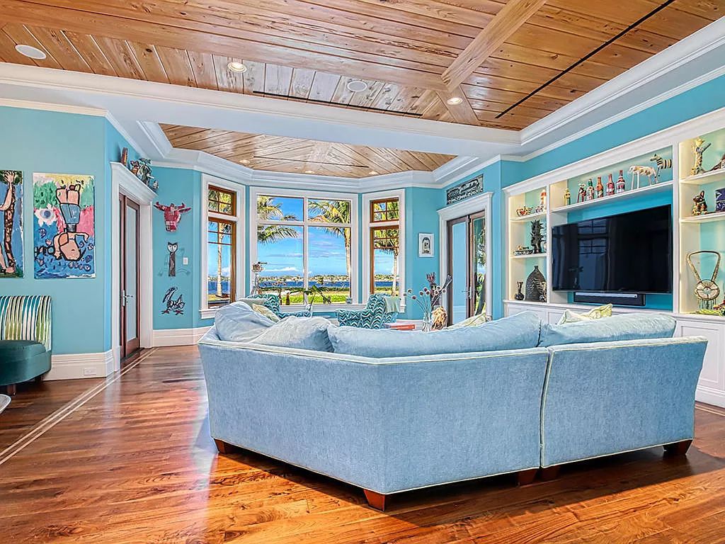 The Waterfront Estate is a Bermuda-Colonial style home has endless wide-water views of the St. Lucie River and Inlet now available for sale. This home located at 3015 SE Saint Lucie Blvd, Stuart, Florida; offering 4 bedrooms and 7 bathrooms with over 7,700 square feet of living spaces.