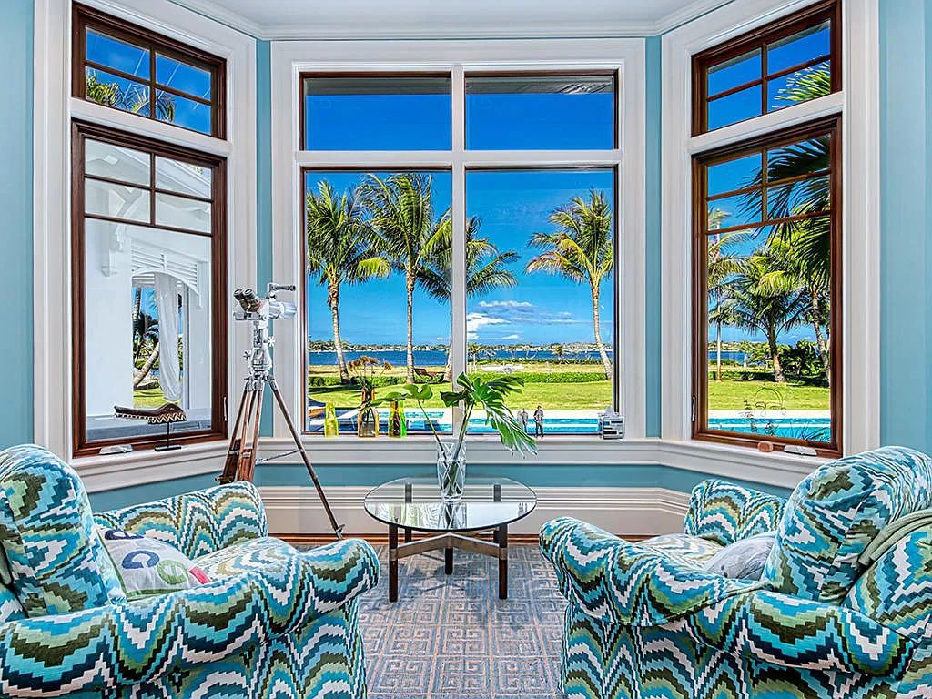The Waterfront Estate is a Bermuda-Colonial style home has endless wide-water views of the St. Lucie River and Inlet now available for sale. This home located at 3015 SE Saint Lucie Blvd, Stuart, Florida; offering 4 bedrooms and 7 bathrooms with over 7,700 square feet of living spaces.
