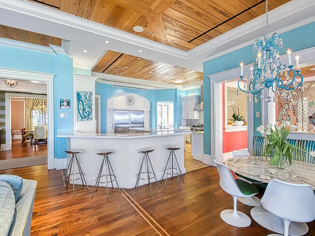 The Waterfront Estate is a Bermuda-Colonial style home has endless wide-water views of the St. Lucie River and Inlet now available for sale. This home located at 3015 SE Saint Lucie Blvd, Stuart, Florida; offering 4 bedrooms and 7 bathrooms with over 7,700 square feet of living spaces.