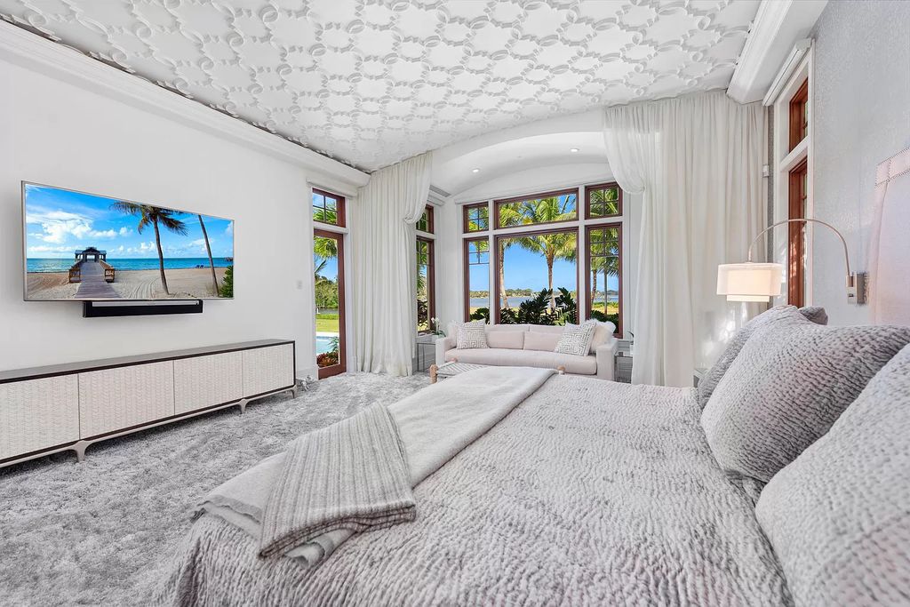 The Waterfront Estate is a Bermuda-Colonial style home has endless wide-water views of the St. Lucie River and Inlet now available for sale. This home located at 3015 SE Saint Lucie Blvd, Stuart, Florida; offering 4 bedrooms and 7 bathrooms with over 7,700 square feet of living spaces.