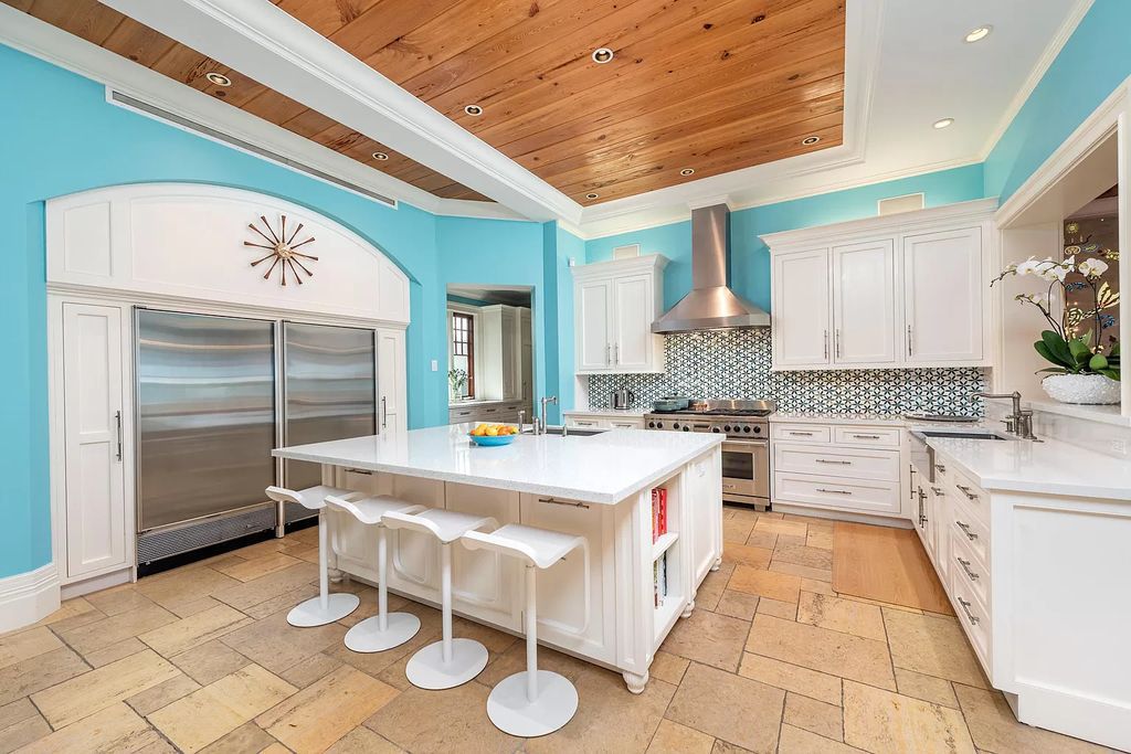 The Waterfront Estate is a Bermuda-Colonial style home has endless wide-water views of the St. Lucie River and Inlet now available for sale. This home located at 3015 SE Saint Lucie Blvd, Stuart, Florida; offering 4 bedrooms and 7 bathrooms with over 7,700 square feet of living spaces.