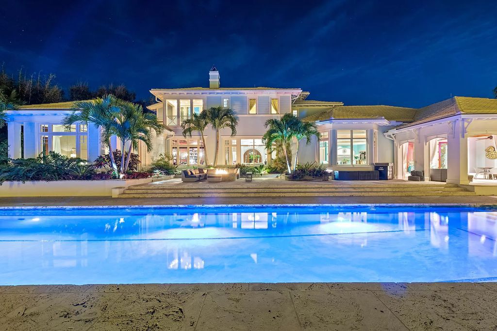 The Waterfront Estate is a Bermuda-Colonial style home has endless wide-water views of the St. Lucie River and Inlet now available for sale. This home located at 3015 SE Saint Lucie Blvd, Stuart, Florida; offering 4 bedrooms and 7 bathrooms with over 7,700 square feet of living spaces.