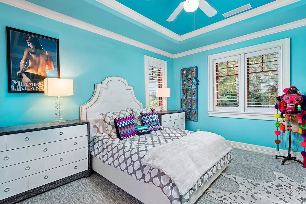 The Waterfront Estate is a Bermuda-Colonial style home has endless wide-water views of the St. Lucie River and Inlet now available for sale. This home located at 3015 SE Saint Lucie Blvd, Stuart, Florida; offering 4 bedrooms and 7 bathrooms with over 7,700 square feet of living spaces.