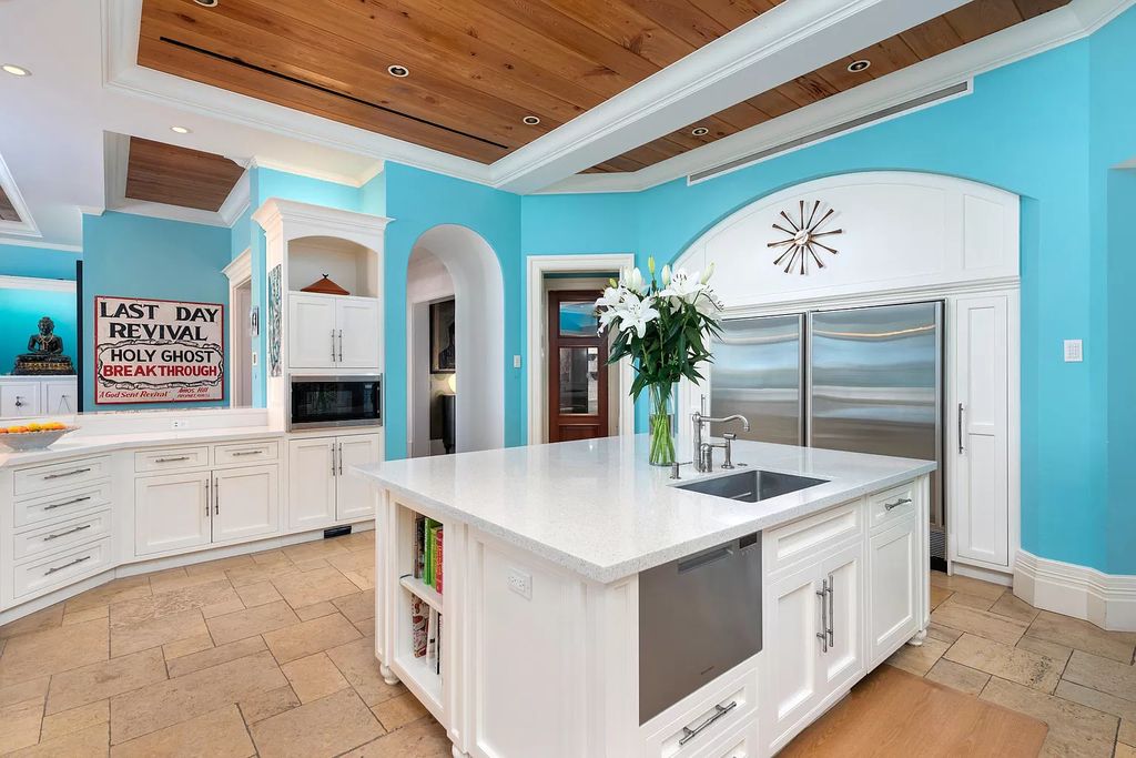 The Waterfront Estate is a Bermuda-Colonial style home has endless wide-water views of the St. Lucie River and Inlet now available for sale. This home located at 3015 SE Saint Lucie Blvd, Stuart, Florida; offering 4 bedrooms and 7 bathrooms with over 7,700 square feet of living spaces.