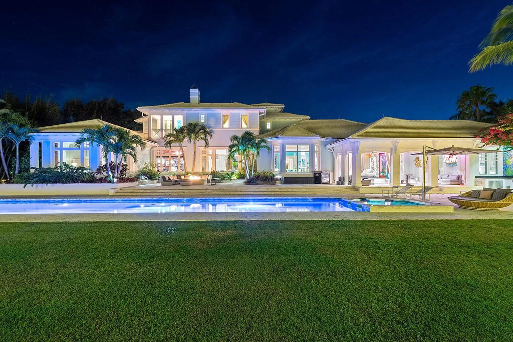 The Waterfront Estate is a Bermuda-Colonial style home has endless wide-water views of the St. Lucie River and Inlet now available for sale. This home located at 3015 SE Saint Lucie Blvd, Stuart, Florida; offering 4 bedrooms and 7 bathrooms with over 7,700 square feet of living spaces.