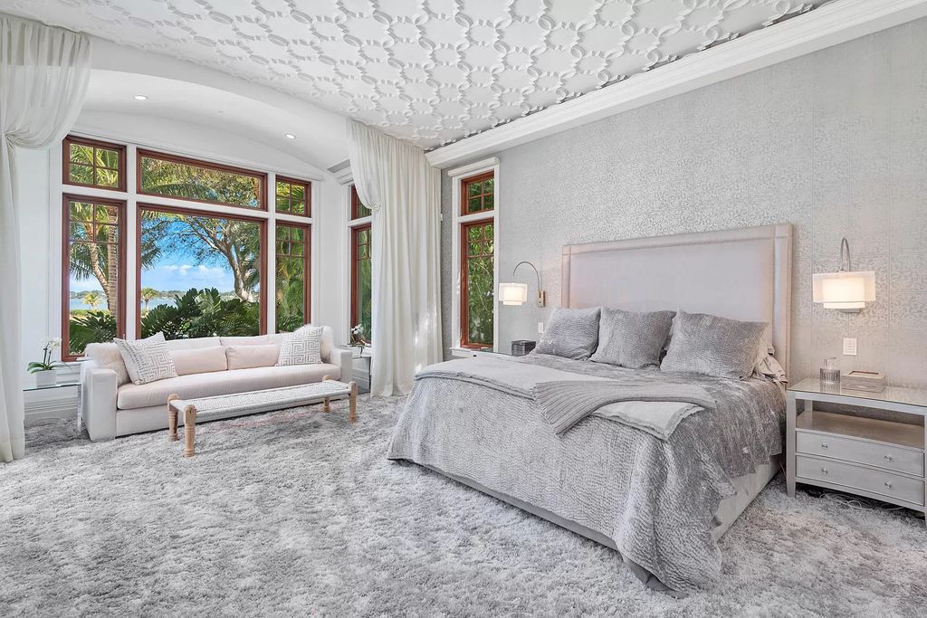 The Waterfront Estate is a Bermuda-Colonial style home has endless wide-water views of the St. Lucie River and Inlet now available for sale. This home located at 3015 SE Saint Lucie Blvd, Stuart, Florida; offering 4 bedrooms and 7 bathrooms with over 7,700 square feet of living spaces.
