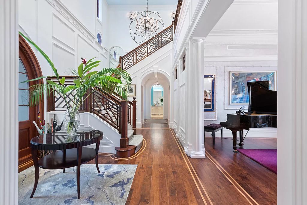 The Waterfront Estate is a Bermuda-Colonial style home has endless wide-water views of the St. Lucie River and Inlet now available for sale. This home located at 3015 SE Saint Lucie Blvd, Stuart, Florida; offering 4 bedrooms and 7 bathrooms with over 7,700 square feet of living spaces.