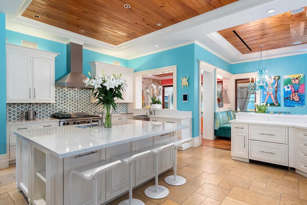 The Waterfront Estate is a Bermuda-Colonial style home has endless wide-water views of the St. Lucie River and Inlet now available for sale. This home located at 3015 SE Saint Lucie Blvd, Stuart, Florida; offering 4 bedrooms and 7 bathrooms with over 7,700 square feet of living spaces.