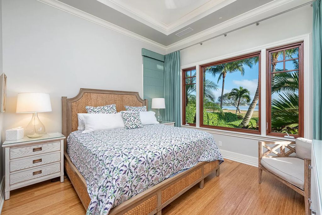 The Waterfront Estate is a Bermuda-Colonial style home has endless wide-water views of the St. Lucie River and Inlet now available for sale. This home located at 3015 SE Saint Lucie Blvd, Stuart, Florida; offering 4 bedrooms and 7 bathrooms with over 7,700 square feet of living spaces.