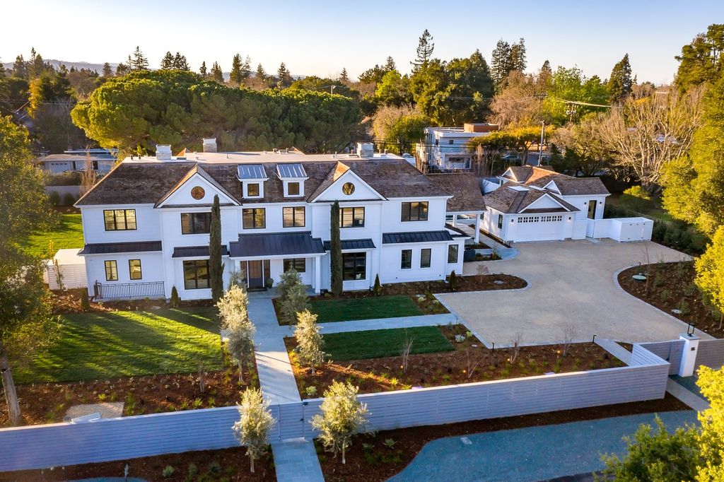 The House in Atherton is a grand estate offers the ultimate in high-end luxury while providing an unmatched living experience now available for sale. This home located at 55 Irving Ave, Atherton, California; offering 8 bedrooms and 11 bathrooms with over 10,500 square feet of living spaces.