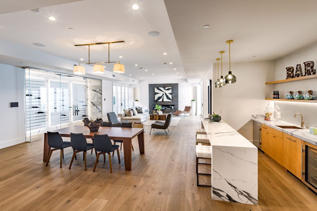 The House in Atherton is a grand estate offers the ultimate in high-end luxury while providing an unmatched living experience now available for sale. This home located at 55 Irving Ave, Atherton, California; offering 8 bedrooms and 11 bathrooms with over 10,500 square feet of living spaces.