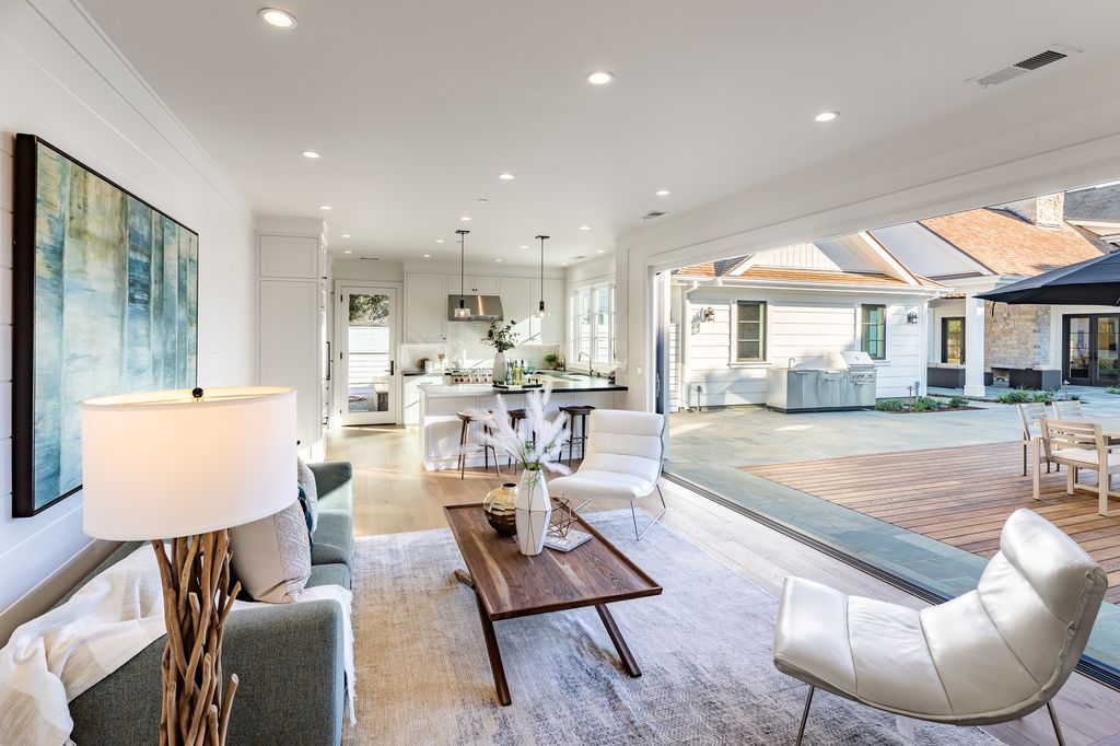 The House in Atherton is a grand estate offers the ultimate in high-end luxury while providing an unmatched living experience now available for sale. This home located at 55 Irving Ave, Atherton, California; offering 8 bedrooms and 11 bathrooms with over 10,500 square feet of living spaces.