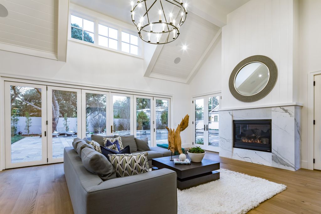 The House in Atherton is a grand estate offers the ultimate in high-end luxury while providing an unmatched living experience now available for sale. This home located at 55 Irving Ave, Atherton, California; offering 8 bedrooms and 11 bathrooms with over 10,500 square feet of living spaces.
