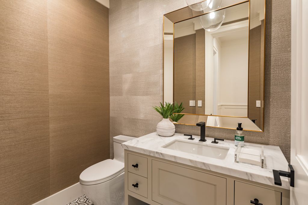 The House in Atherton is a grand estate offers the ultimate in high-end luxury while providing an unmatched living experience now available for sale. This home located at 55 Irving Ave, Atherton, California; offering 8 bedrooms and 11 bathrooms with over 10,500 square feet of living spaces.