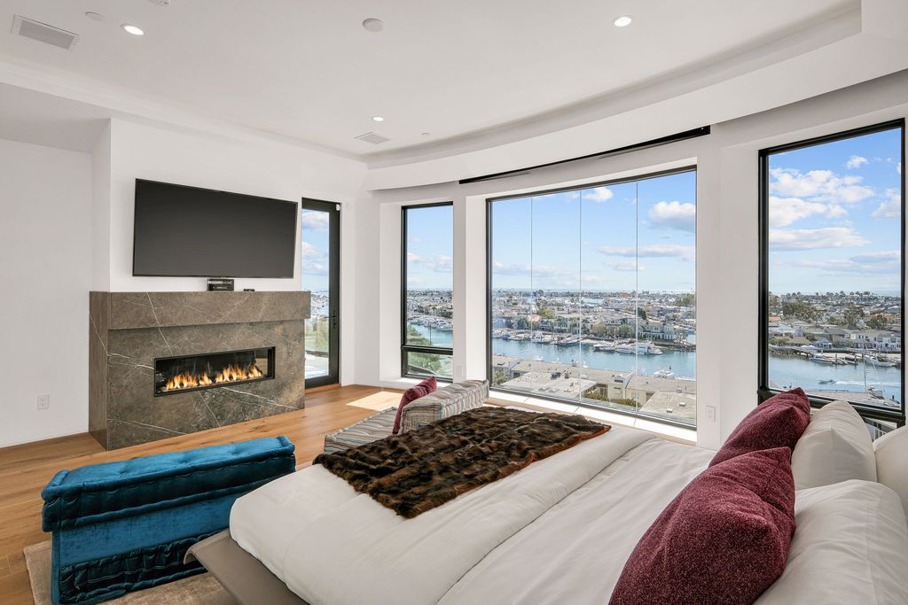The California Contemporary Home is a luxuriously newly constructed residence with panoramic vistas of Newport Harbor now available for sale. This home located at 1215 Dolphin Ter, Corona Del Mar, California; offering 6 bedrooms and 8 bathrooms with over 7,200 square feet of living spaces.