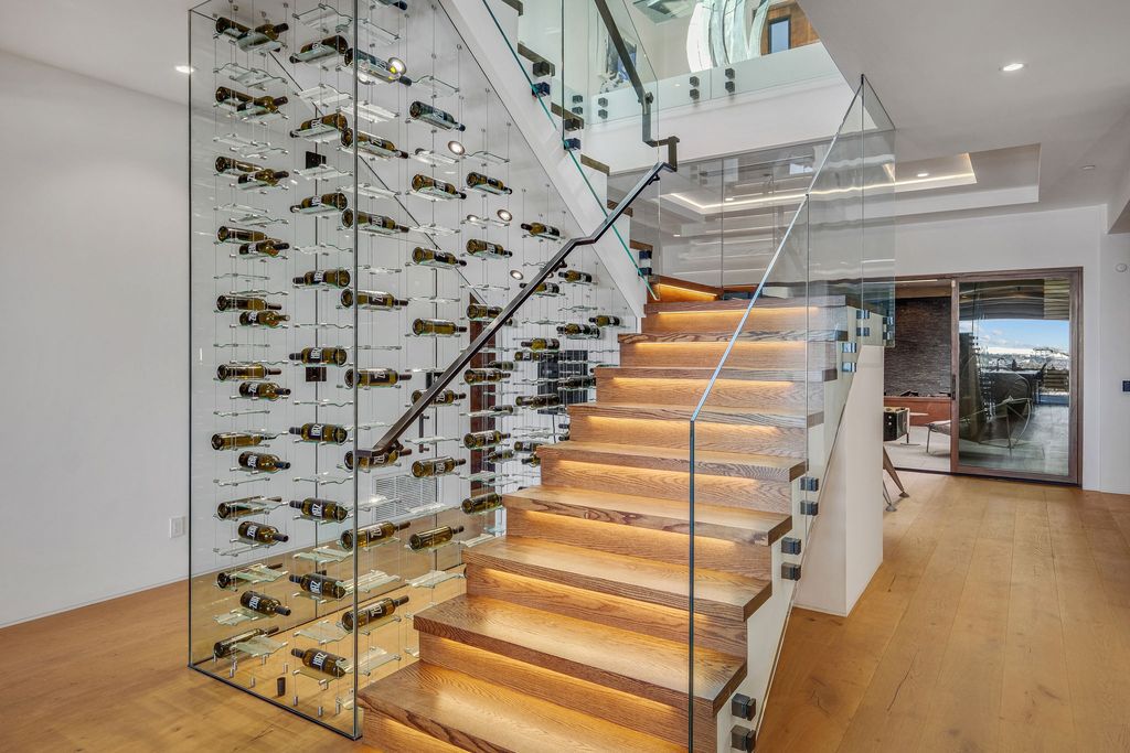 The California Contemporary Home is a luxuriously newly constructed residence with panoramic vistas of Newport Harbor now available for sale. This home located at 1215 Dolphin Ter, Corona Del Mar, California; offering 6 bedrooms and 8 bathrooms with over 7,200 square feet of living spaces.