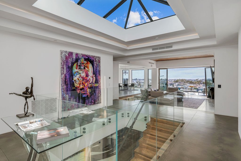 The California Contemporary Home is a luxuriously newly constructed residence with panoramic vistas of Newport Harbor now available for sale. This home located at 1215 Dolphin Ter, Corona Del Mar, California; offering 6 bedrooms and 8 bathrooms with over 7,200 square feet of living spaces.
