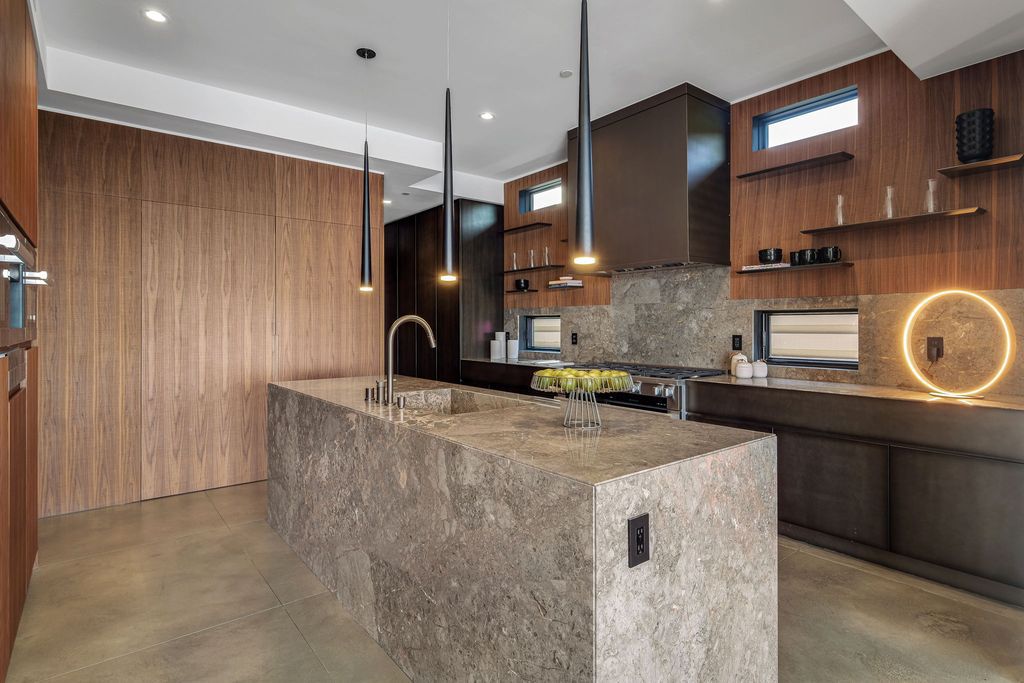 The California Contemporary Home is a luxuriously newly constructed residence with panoramic vistas of Newport Harbor now available for sale. This home located at 1215 Dolphin Ter, Corona Del Mar, California; offering 6 bedrooms and 8 bathrooms with over 7,200 square feet of living spaces.