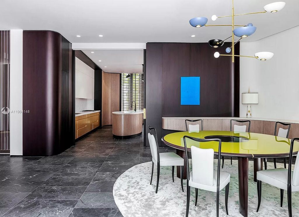 The Miami Beach Home is a new residence designed by world design star Achille Salvagni with a 90 ft infinity pool and private boat dock now available for sale. This home located at 810 Lakeview Dr, Miami Beach, Florida; offering 7 bedrooms and 7 bathrooms with over 7,900 square feet of living spaces.