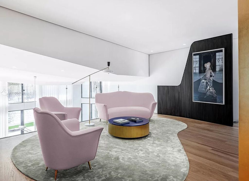 The Miami Beach Home is a new residence designed by world design star Achille Salvagni with a 90 ft infinity pool and private boat dock now available for sale. This home located at 810 Lakeview Dr, Miami Beach, Florida; offering 7 bedrooms and 7 bathrooms with over 7,900 square feet of living spaces.