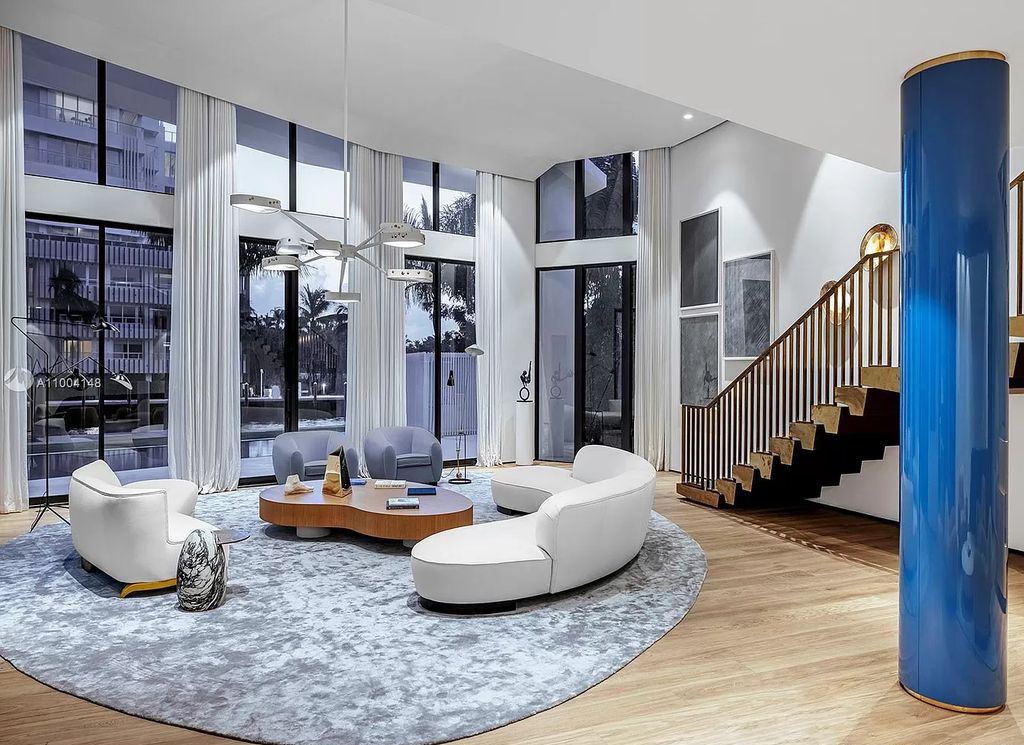 The Miami Beach Home is a new residence designed by world design star Achille Salvagni with a 90 ft infinity pool and private boat dock now available for sale. This home located at 810 Lakeview Dr, Miami Beach, Florida; offering 7 bedrooms and 7 bathrooms with over 7,900 square feet of living spaces.