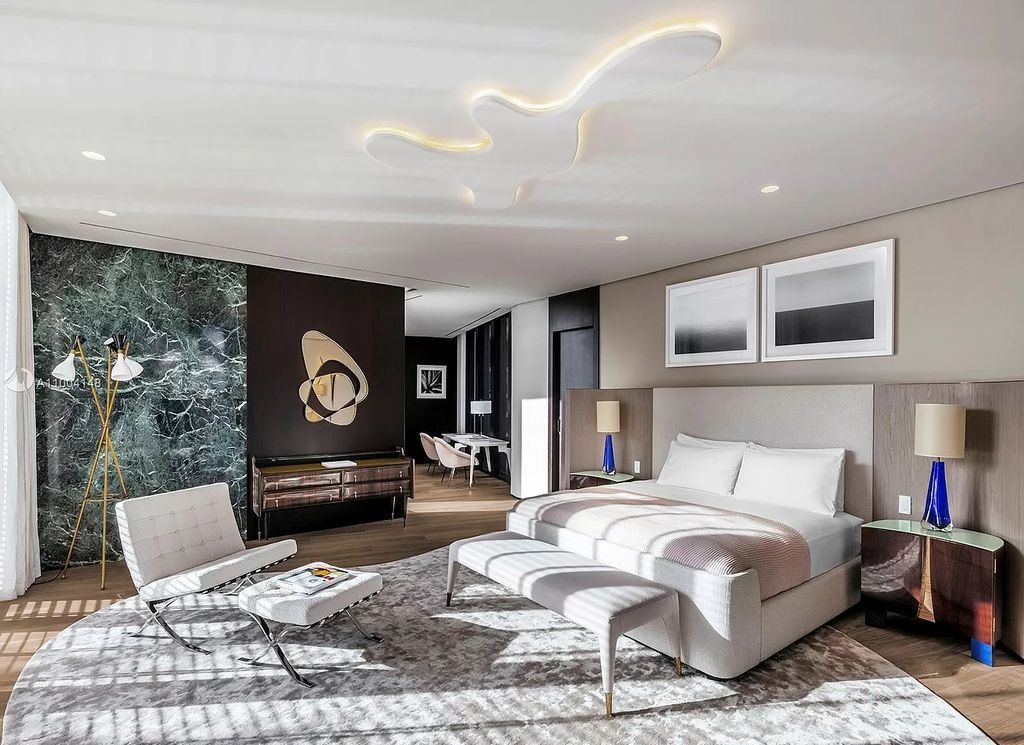 The Miami Beach Home is a new residence designed by world design star Achille Salvagni with a 90 ft infinity pool and private boat dock now available for sale. This home located at 810 Lakeview Dr, Miami Beach, Florida; offering 7 bedrooms and 7 bathrooms with over 7,900 square feet of living spaces.