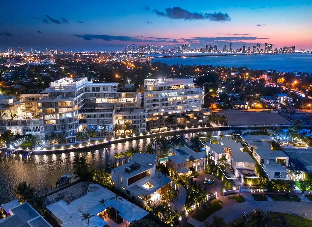The Miami Beach Home is a new residence designed by world design star Achille Salvagni with a 90 ft infinity pool and private boat dock now available for sale. This home located at 810 Lakeview Dr, Miami Beach, Florida; offering 7 bedrooms and 7 bathrooms with over 7,900 square feet of living spaces.