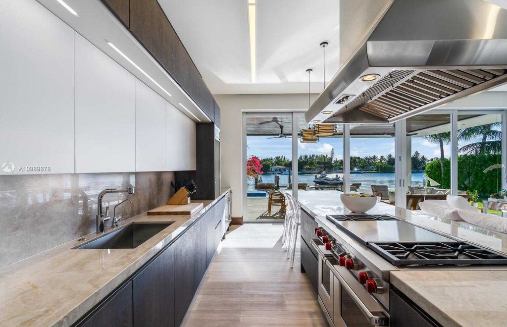 The Miami Beach Villa is a luxurious home perfect for entertaining with large manicured garden and full outdoor kitchen now available for sale. This home located at 1220 S Biscayne Point Rd, Miami Beach, Florida; offering 6 bedrooms and 6 bathrooms with over 5,400 square feet of living spaces.