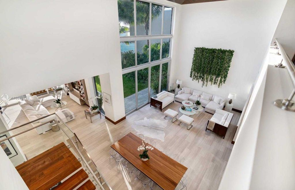 The Miami Beach Villa is a luxurious home perfect for entertaining with large manicured garden and full outdoor kitchen now available for sale. This home located at 1220 S Biscayne Point Rd, Miami Beach, Florida; offering 6 bedrooms and 6 bathrooms with over 5,400 square feet of living spaces.