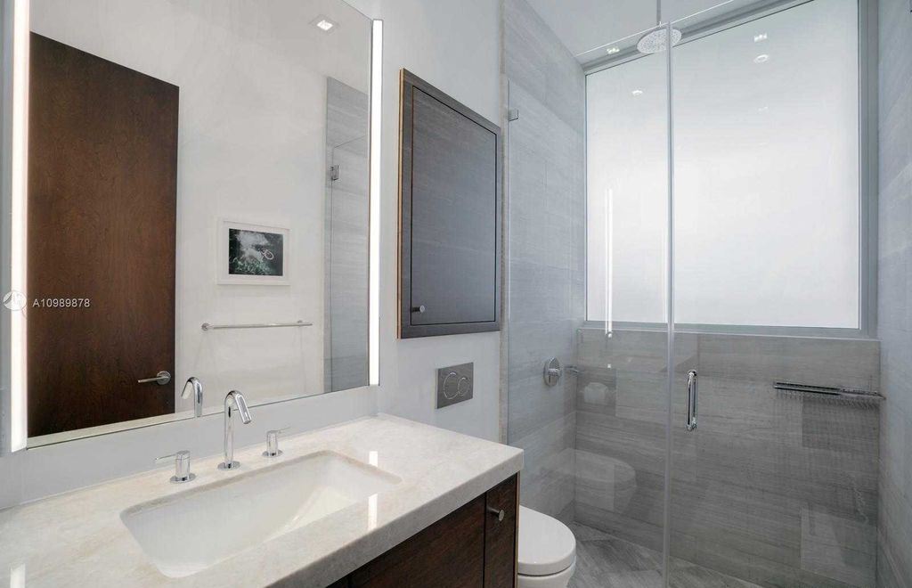The Miami Beach Villa is a luxurious home perfect for entertaining with large manicured garden and full outdoor kitchen now available for sale. This home located at 1220 S Biscayne Point Rd, Miami Beach, Florida; offering 6 bedrooms and 6 bathrooms with over 5,400 square feet of living spaces.