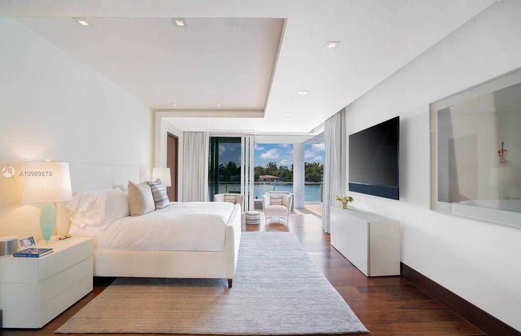 The Miami Beach Villa is a luxurious home perfect for entertaining with large manicured garden and full outdoor kitchen now available for sale. This home located at 1220 S Biscayne Point Rd, Miami Beach, Florida; offering 6 bedrooms and 6 bathrooms with over 5,400 square feet of living spaces.