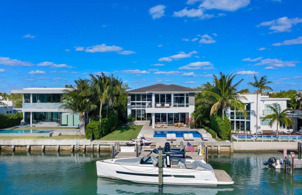 The Miami Beach Villa is a luxurious home perfect for entertaining with large manicured garden and full outdoor kitchen now available for sale. This home located at 1220 S Biscayne Point Rd, Miami Beach, Florida; offering 6 bedrooms and 6 bathrooms with over 5,400 square feet of living spaces.