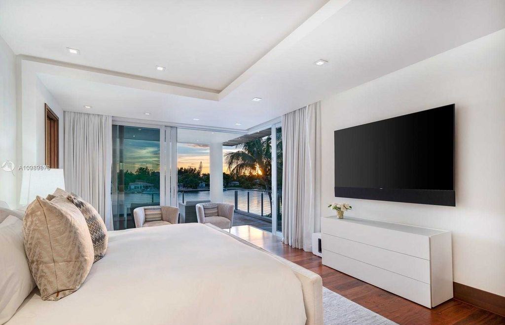 The Miami Beach Villa is a luxurious home perfect for entertaining with large manicured garden and full outdoor kitchen now available for sale. This home located at 1220 S Biscayne Point Rd, Miami Beach, Florida; offering 6 bedrooms and 6 bathrooms with over 5,400 square feet of living spaces.