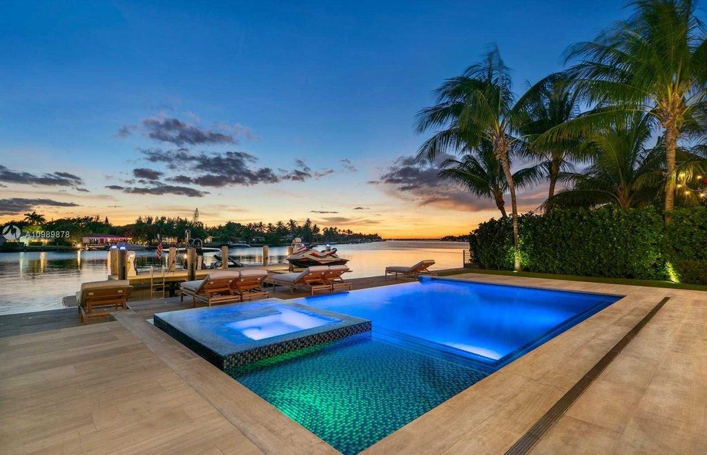 The Miami Beach Villa is a luxurious home perfect for entertaining with large manicured garden and full outdoor kitchen now available for sale. This home located at 1220 S Biscayne Point Rd, Miami Beach, Florida; offering 6 bedrooms and 6 bathrooms with over 5,400 square feet of living spaces.
