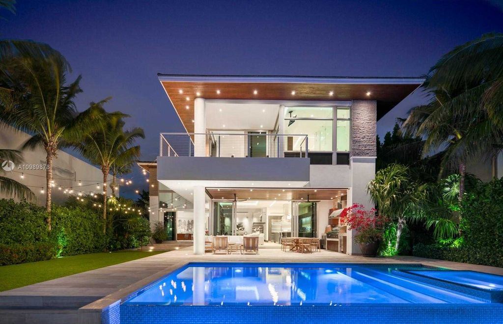 The Miami Beach Villa is a luxurious home perfect for entertaining with large manicured garden and full outdoor kitchen now available for sale. This home located at 1220 S Biscayne Point Rd, Miami Beach, Florida; offering 6 bedrooms and 6 bathrooms with over 5,400 square feet of living spaces.