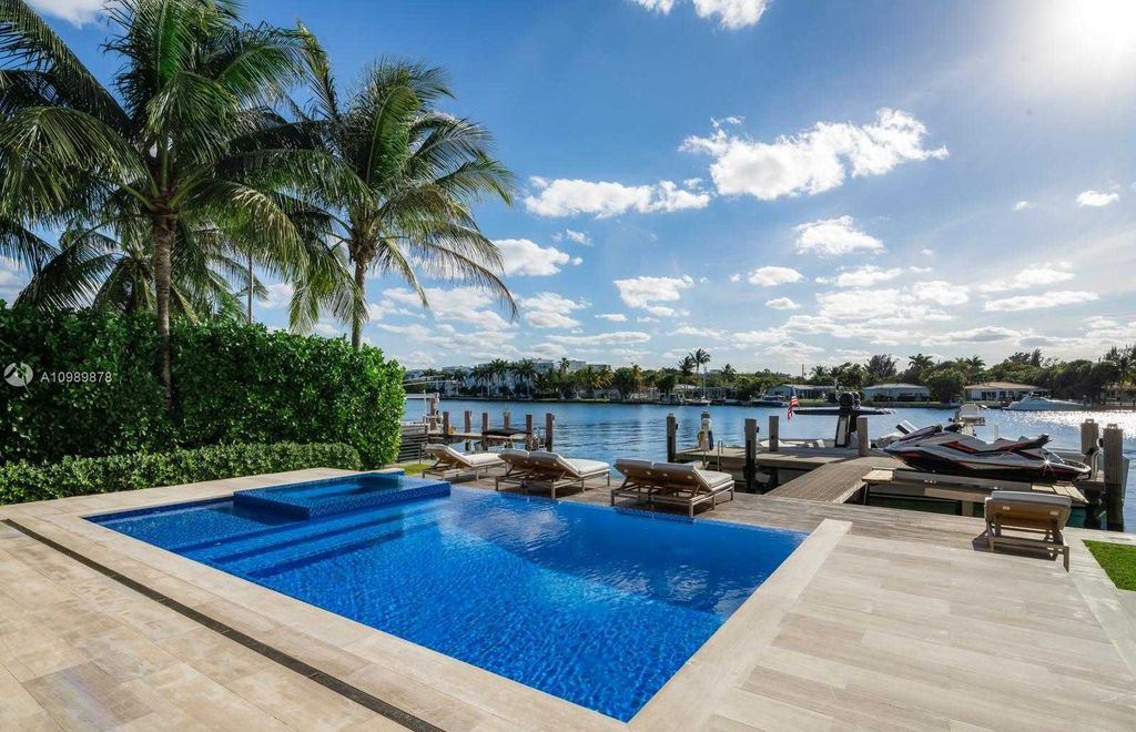 The Miami Beach Villa is a luxurious home perfect for entertaining with large manicured garden and full outdoor kitchen now available for sale. This home located at 1220 S Biscayne Point Rd, Miami Beach, Florida; offering 6 bedrooms and 6 bathrooms with over 5,400 square feet of living spaces.
