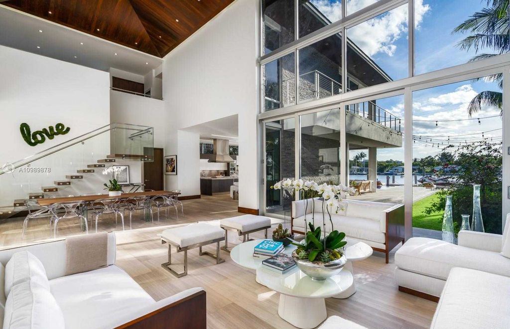The Miami Beach Villa is a luxurious home perfect for entertaining with large manicured garden and full outdoor kitchen now available for sale. This home located at 1220 S Biscayne Point Rd, Miami Beach, Florida; offering 6 bedrooms and 6 bathrooms with over 5,400 square feet of living spaces.