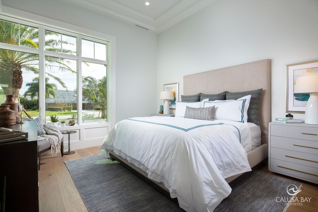 The Contemporary Home is perfectly complemented by lush mature tropical landscaping in the heart of Pelican Bay now available for sale. This home located at 810 Bentwood Dr, Naples, Florida; offering 4 bedrooms and 6 bathrooms with over 4,600 square feet of living spaces.