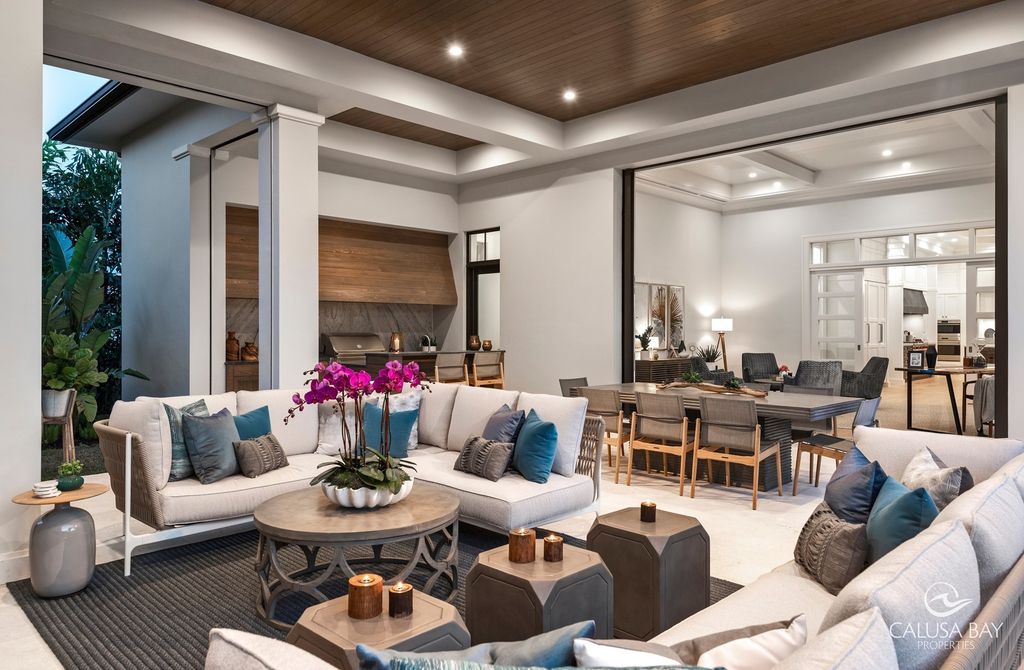 The Contemporary Home is perfectly complemented by lush mature tropical landscaping in the heart of Pelican Bay now available for sale. This home located at 810 Bentwood Dr, Naples, Florida; offering 4 bedrooms and 6 bathrooms with over 4,600 square feet of living spaces.