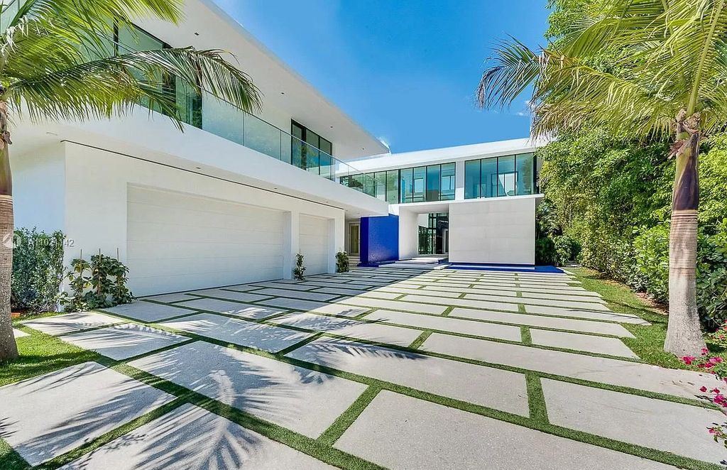 The Resort Style Mansion in Miami Beach is a newly luxurious home with sunsets over the Miami skyline on prestigious North bay road now available for sale. This home located at 5004 N Bay Rd, Miami Beach, Florida; offering 8 bedrooms and 10 bathrooms with over 12,800 square feet of living spaces. 