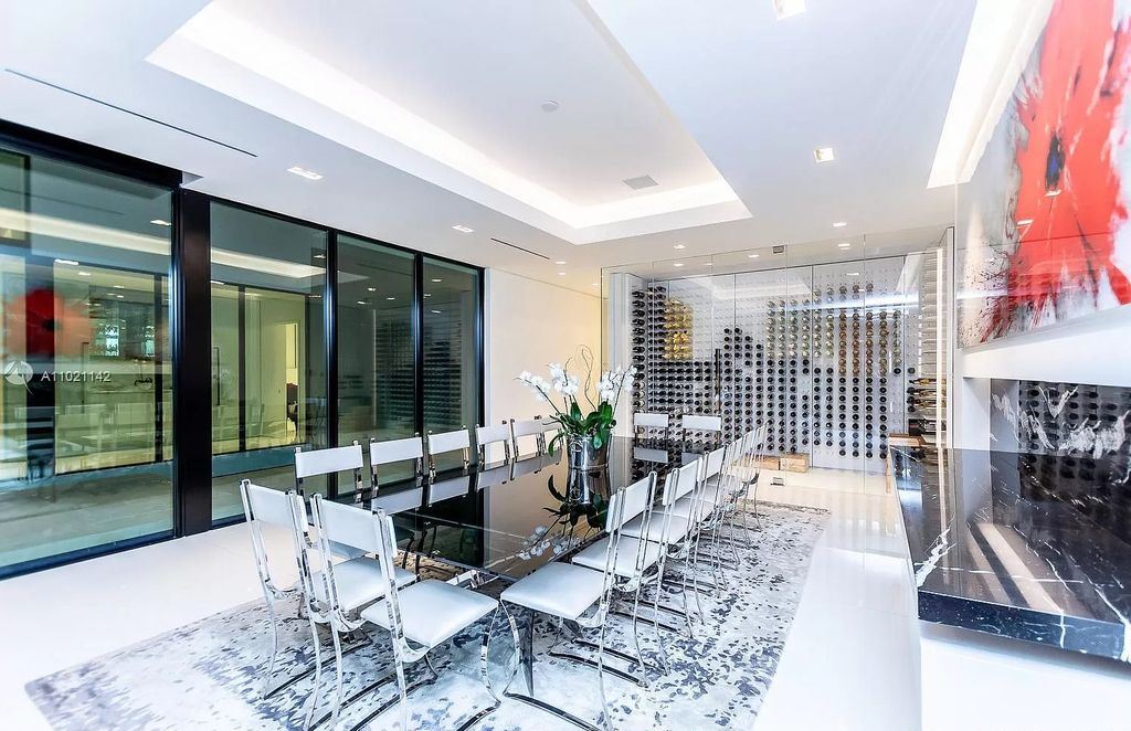 The Resort Style Mansion in Miami Beach is a newly luxurious home with sunsets over the Miami skyline on prestigious North bay road now available for sale. This home located at 5004 N Bay Rd, Miami Beach, Florida; offering 8 bedrooms and 10 bathrooms with over 12,800 square feet of living spaces. 