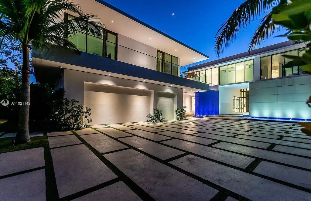 The Resort Style Mansion in Miami Beach is a newly luxurious home with sunsets over the Miami skyline on prestigious North bay road now available for sale. This home located at 5004 N Bay Rd, Miami Beach, Florida; offering 8 bedrooms and 10 bathrooms with over 12,800 square feet of living spaces. 