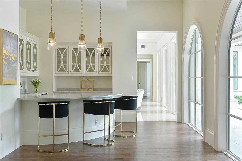 The Custom Home in Texas is a sophisticated Preston Hollow Estate masterfully custom built in 2018 on lushly landscaped now available for sale. This home located at 5400 Edlen Dr, Dallas, Texas; offering 5 bedrooms and 10 bathrooms with over 15,900 square feet of living spaces.