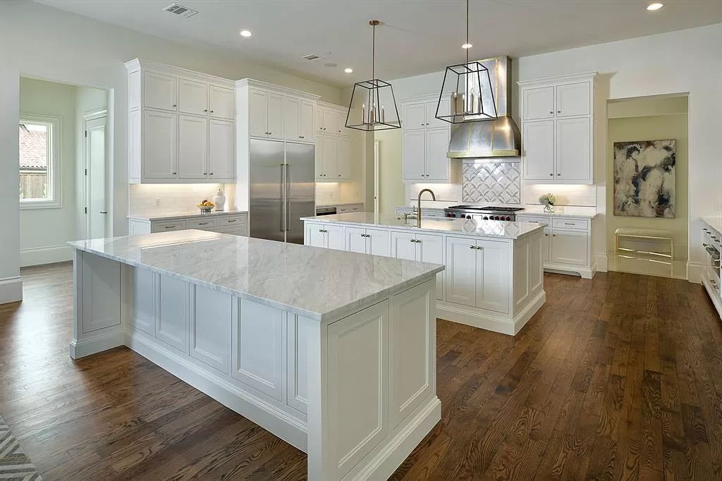 The Custom Home in Texas is a sophisticated Preston Hollow Estate masterfully custom built in 2018 on lushly landscaped now available for sale. This home located at 5400 Edlen Dr, Dallas, Texas; offering 5 bedrooms and 10 bathrooms with over 15,900 square feet of living spaces.