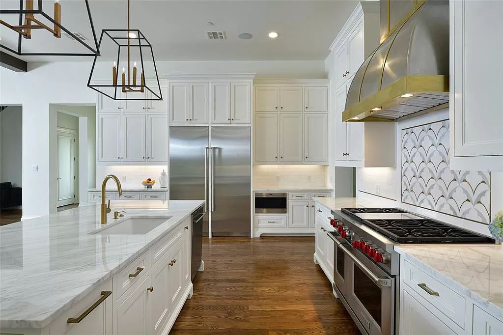 The Custom Home in Texas is a sophisticated Preston Hollow Estate masterfully custom built in 2018 on lushly landscaped now available for sale. This home located at 5400 Edlen Dr, Dallas, Texas; offering 5 bedrooms and 10 bathrooms with over 15,900 square feet of living spaces.